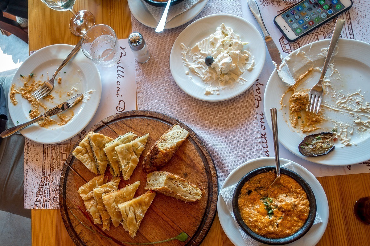 Burek, tarator, and traditional Albanian food on table