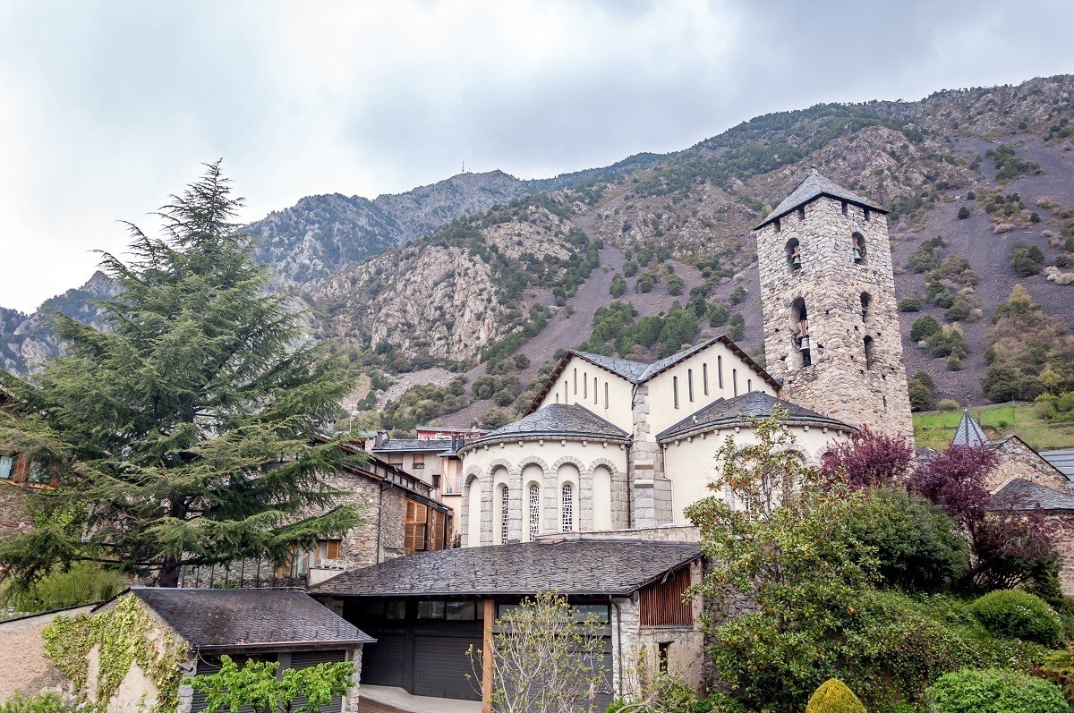 The church in Andorra la Vella with the Pyrenees Mountains towering above.