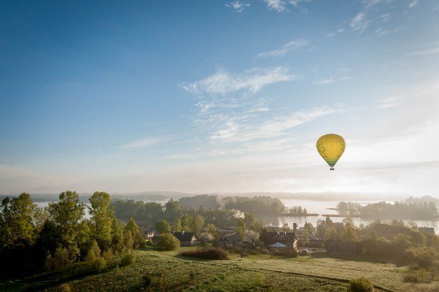 Hot air balloon above the countryside