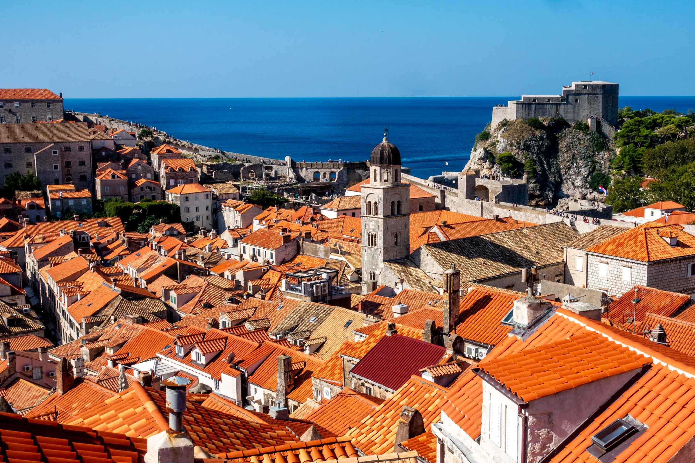 Red roofs of Dubrovnik, Croatia, with the ocean in the distance
