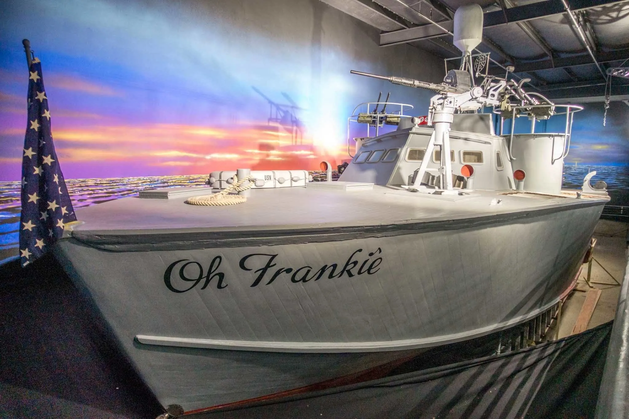 PT-309 boat named Oh Frankie on display at a museum.
